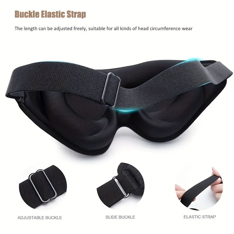 Black sleep mask with adjustable elastic strap on a white background