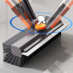 Stiff bristle scrub brush cleaning tile floor