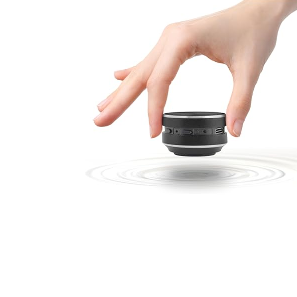 a hand holding the anything speaker with sound waves